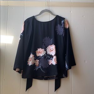 Back tie blouse with opening